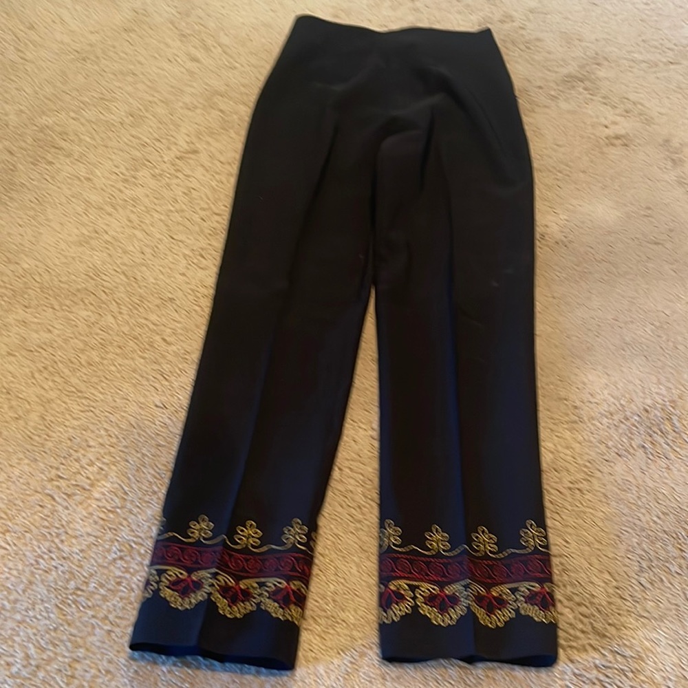 Black pants with embroidery on bottom